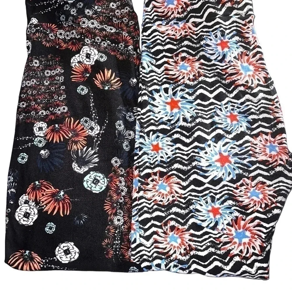 2pair TC lularoe Americana Leggings. One floral flags, one fireworks. VGUC‎